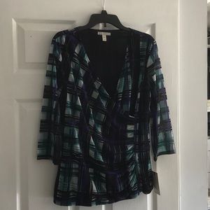 Woman’s top, 100% polyester, lined.